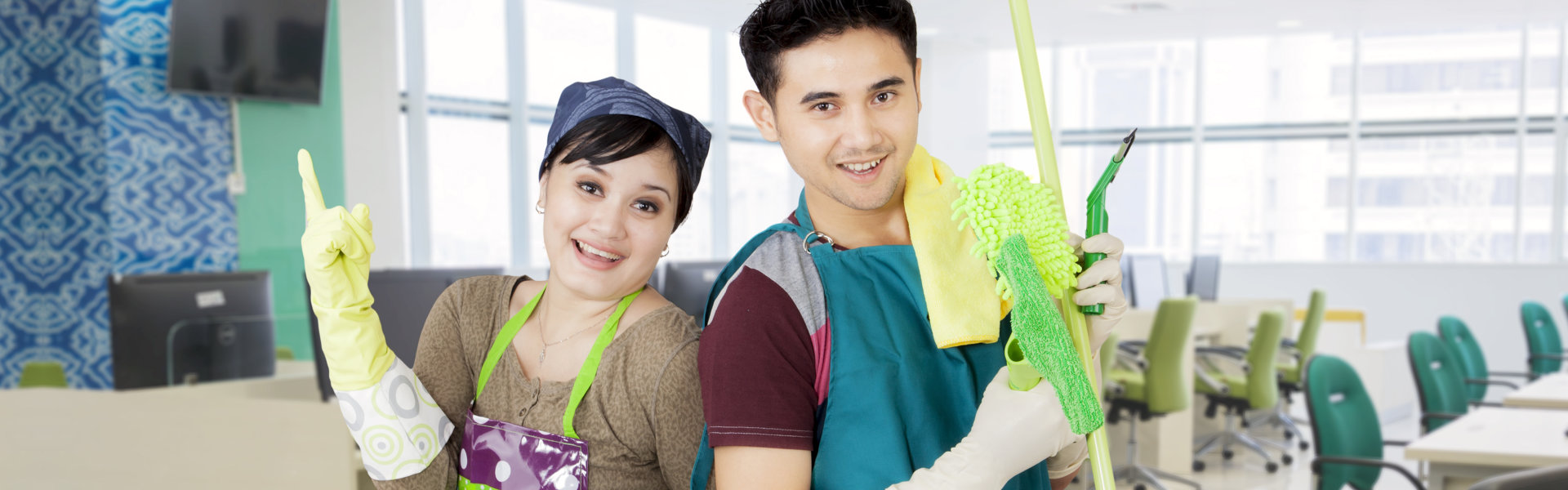 office cleaners couple with tools working cleaning the window